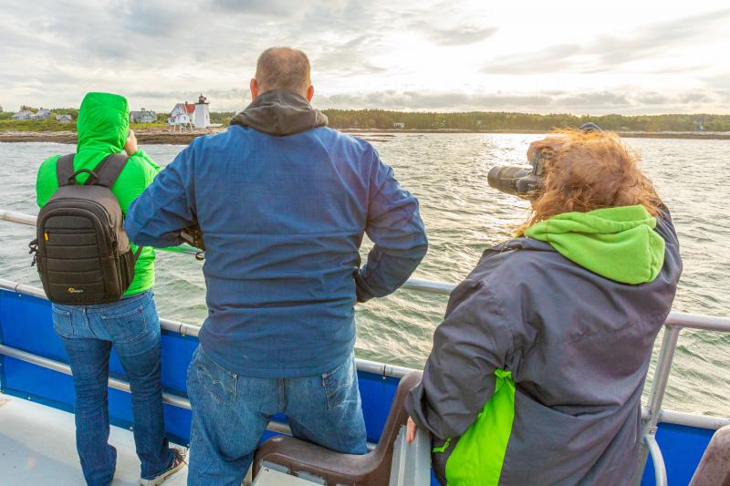 Looking at and photographing Hendricks Head Lighthouse. Mike Leonard photo
