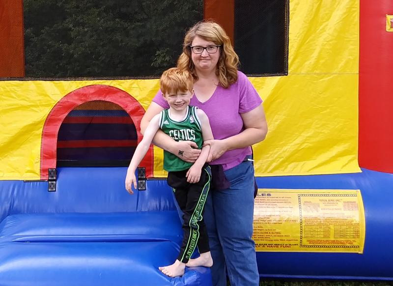 Suzanne Sherman and son Jackson visit the bounce house. JANE CARPENTER/Boothbay Register