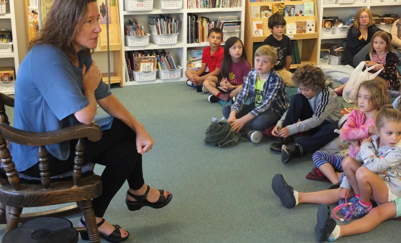 Third and fourth grade teacher Jill Cotta is in the rocking chair leading morning meeting, a daily ritual at the private demonstration school in Edgecomb. BILL PEARSON/Boothbay Register