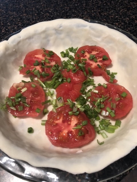 Tomatoes and sliced scallions in the pie crust. Lisa Orne Hallinan photo