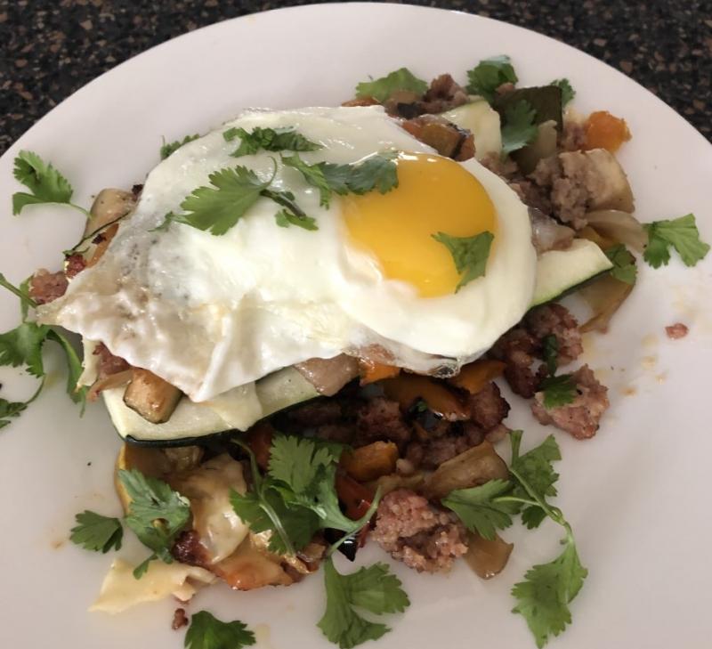 Gluten-free zucchini boat with a fried egg on top. Lisa Orne Hallinan photo