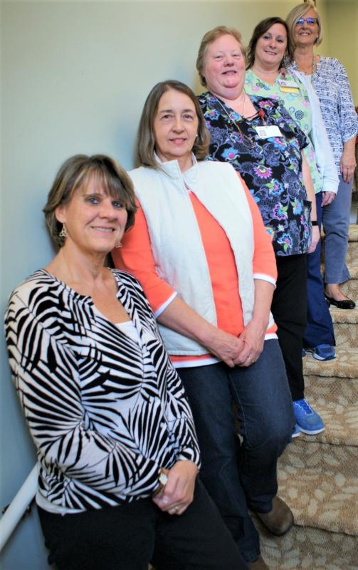 Seven employees have been with Chase Point Assisted Living since it opened in 1999. Pictured from left are Karen Sawyer, administrative assistant; Karen Genthner, CRMA; Sallie Sidelinger, CNA-M; Kelli Lewis, CRMA; and Sherry McCormick, clinical manager. Missing from the photograph are Michelle Welch, CRMA and Doreen Moody, administrative assistant. Courtesy of LincolnHealth