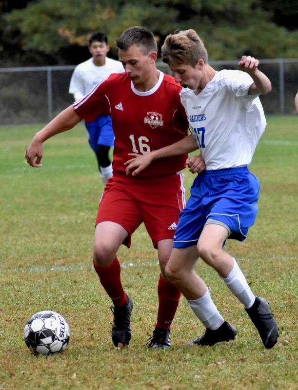Gavin Loupe and Oak Hill’s Caleb Leighton. PHIL DI VECE/Wiscasset Newspaper