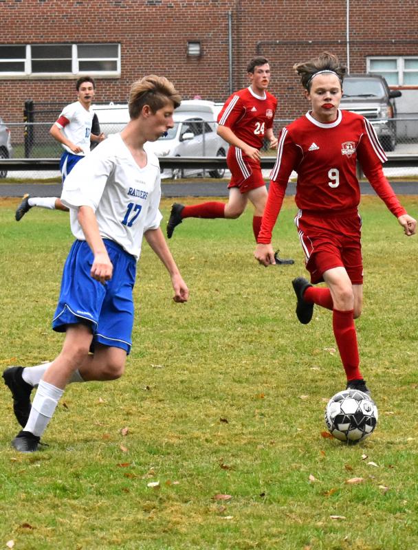 Adam Hodson is shown with the ball in Tuesday’s game with Oak Hill. PHIL DI VECE/Wiscasset Newspaper
