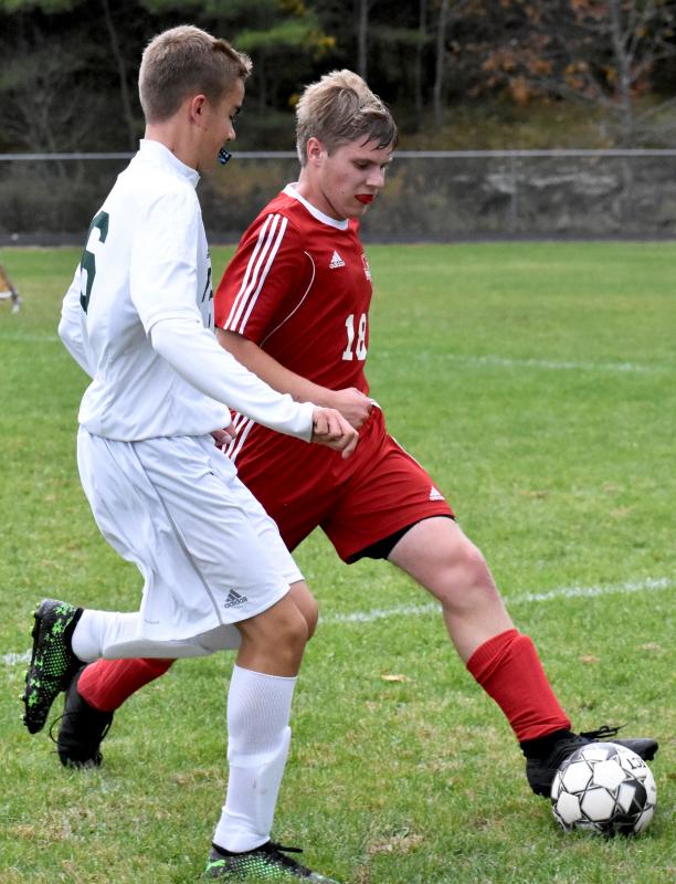 Josh Jones has a busy day in the Wiscasset/Boothbay backfield. PHIL DI VECE/Wiscasset Newspaper