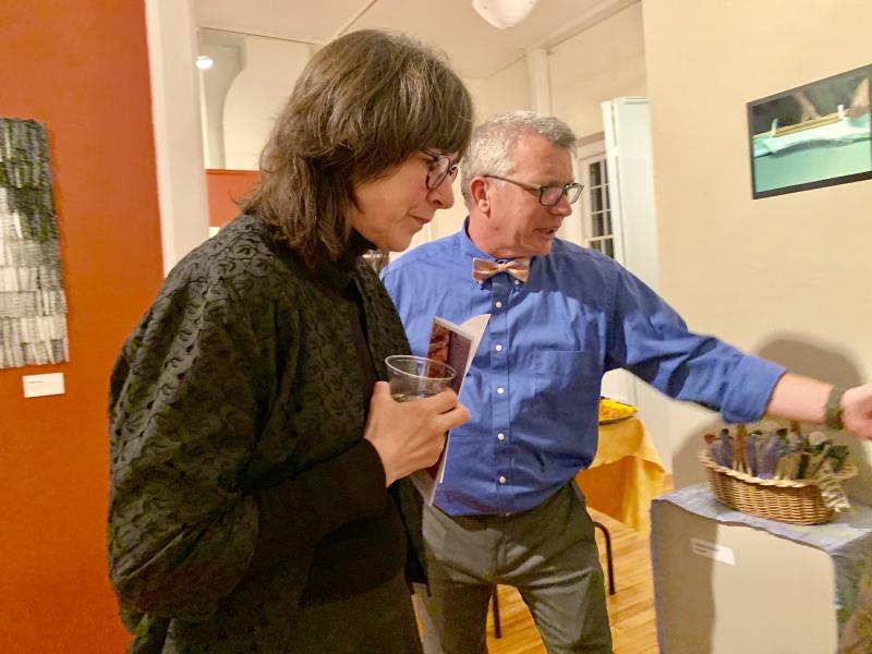 Woolwich’s Danny Evarts shows Bristol’s Tricia Losornio a dressmaker’s smocking machine he said was used by his partner Tommy Davis’s late mother, fiber artist Ardyth Davis. SUSAN JOHNS/Wiscasset Newspaper