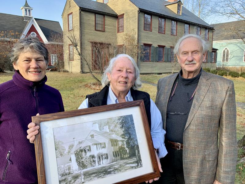 LCHA’s Judith Sutter, left, and Perry Palmer with William Dykes and the framed photo, now his. SUSAN JOHNS/Wiscasset Newspaper