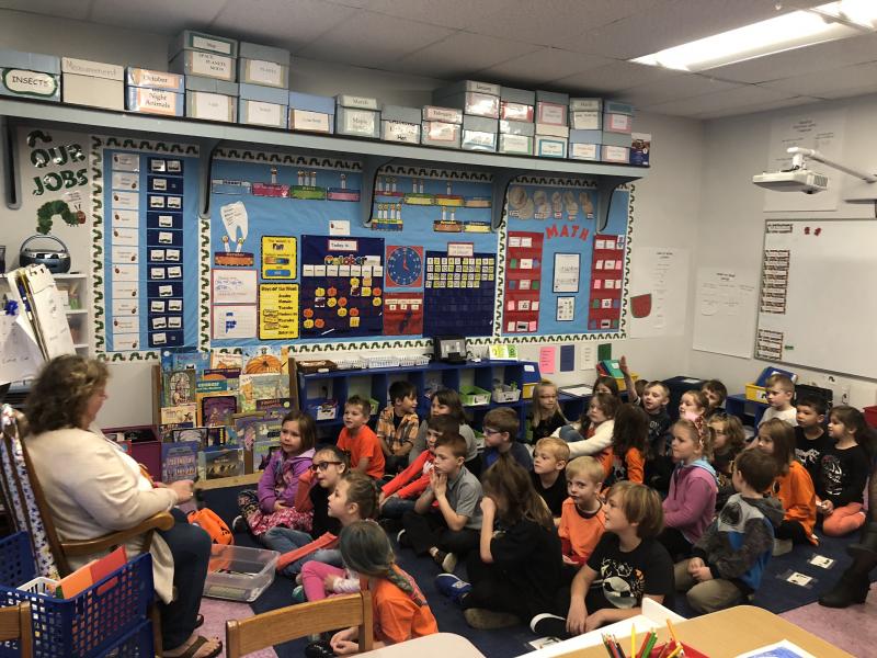 Trae Stover and Katelyn Beedy's first grade classrooms are learning about being safe, respectful and responsible on the school bus. Lead driver Pam Harding explains the importance of bus safety. Cindy Collamore photo