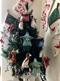 Christmas decorations and stockings by Linda Brewer. Courtesy of Sanny Norton