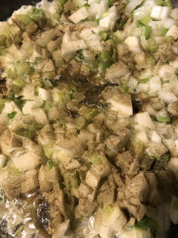 Adding the seasoning. Lisa Orne Hallinan photo
