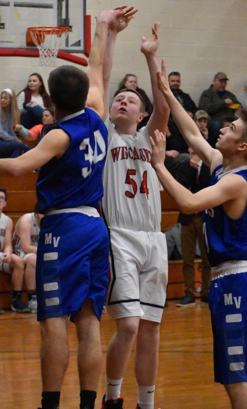 Noah Haggett takes a jump shot against the Falcons. PHIL DI VECE/Wiscasset Newspaper