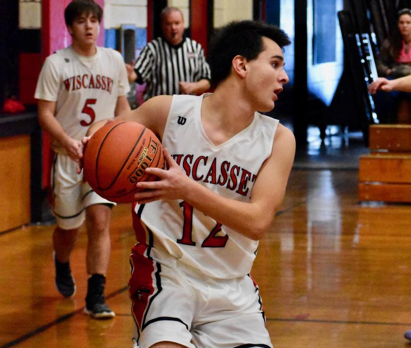 Matt Eckert comes away with a rebound early in the first half of Saturday’s game. PHIL DI VECE/Wiscasset Newspaper