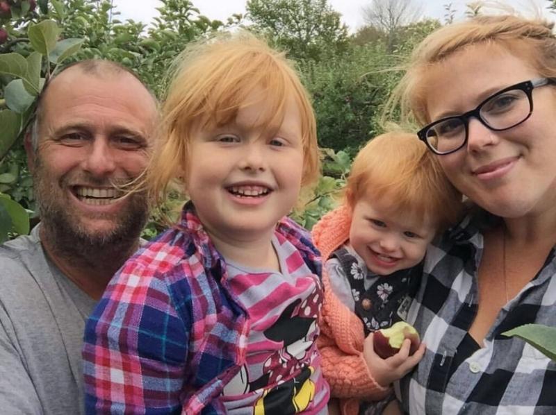 Chris Pinkham with his family, daughters Dorothy and Cedelia and wife, Jessica. Courtesy of Jessica Pinkham