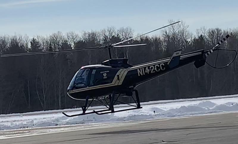 Airport Manager Rick Tetrev said Ken Boudin owns this helicopter leaving the ground Jan. 23. SUSAN JOHNS/Wiscasset Newspaper