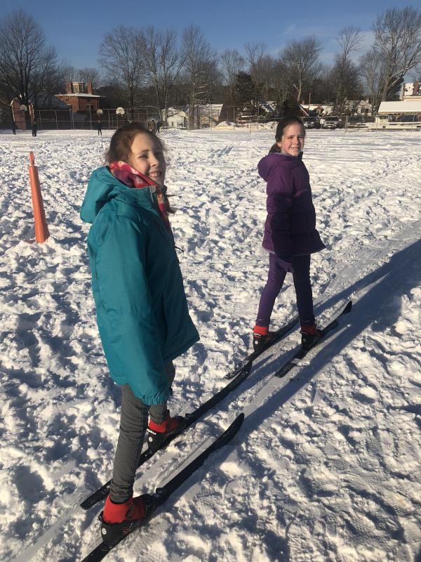 Fifth grade students Ella Sullivan, left, and Ava Zimmerman on their cross-country skis. Cindy Collamore photo