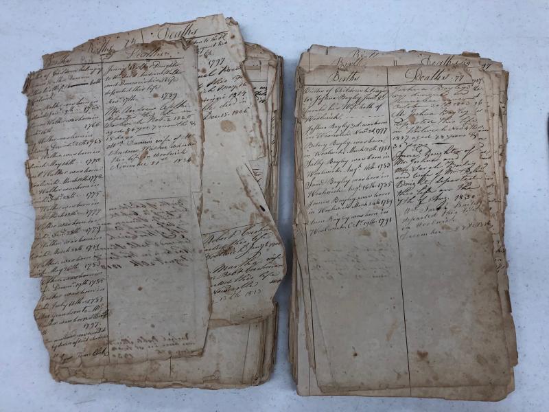 The old birth and death records as they looked before being restored. Courtesy photo