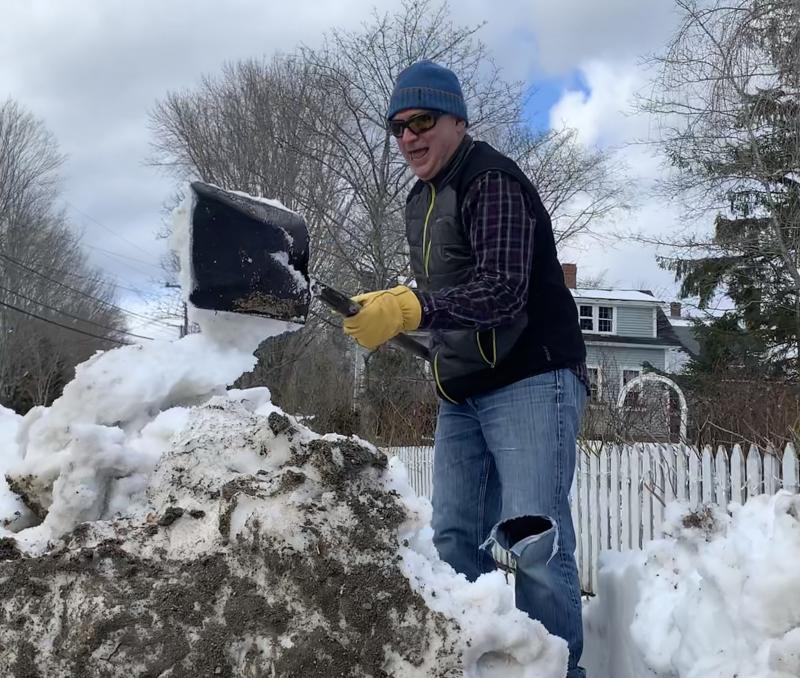 Steve Graffam gets snow off the Federal Street, Wiscasset sidewalk Saturday. SUSAN JOHNS/Wiscasset Newspaper