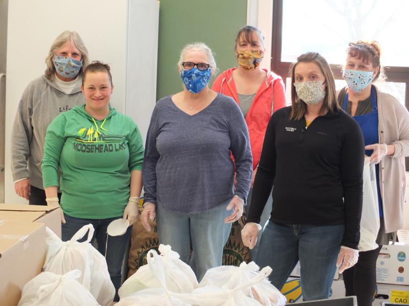 Five days a week, the Wiscasset schools’ cafeteria staff is busying preparing a combined 500 breakfasts and lunches for students during the coronavirus pandemic. Pictured: front row: from left, Heidi Thiboutot, Bonnie Morton and Katie Ruzyckij; back row: Lorie Johnson, Katie Bryant and Theresa Meehan. BILL PEARSON/Boothbay Register