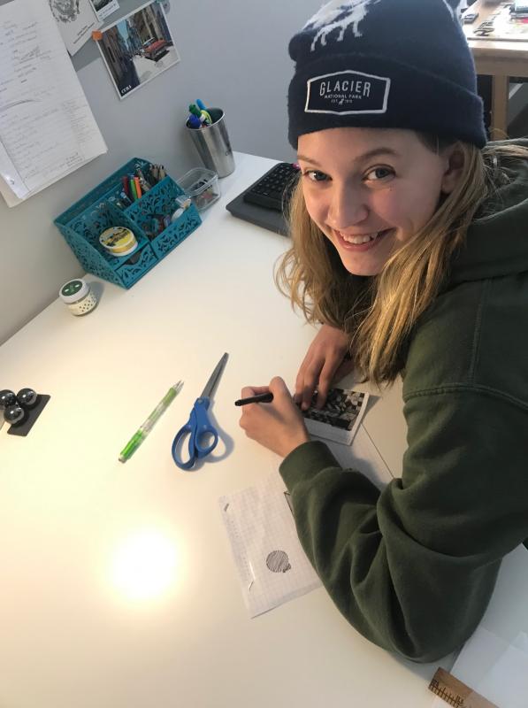 Writing a letter to a nursing home resident. Courtesy of Damariscotta Montessori