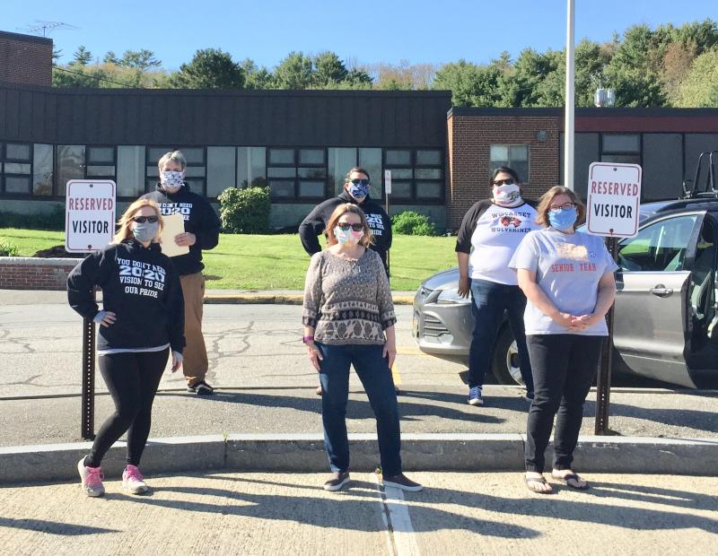 Senior class advisors prepare to surprise seniors with gifts May 21. Front, from left, are Hollie Paul, Deb Pooler and Kim Andersson; back, from left, are Chris Hammond, Prema Long and Adrienne Fraire. Courtesy photo