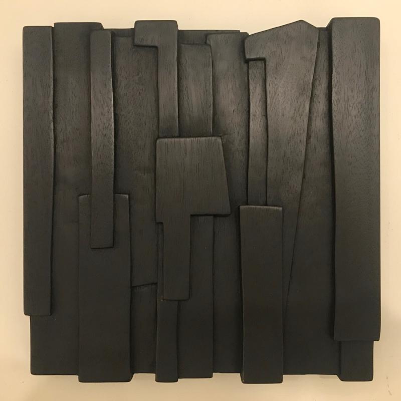One in a series of seven mahogany, carved relief wall sculptures, 11” x 11” x 1” in the sunlight, by Eben Blaney. Eben Blaney.