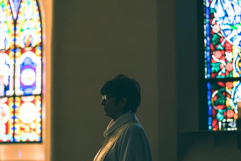 The Rev. Carolyn H. Eklund of St. Paul’s Episcopal Church is photographed in Brunswick on Sunday, May 3. Eklund has been administering the last rites remotely via Zoom due to COVID-19. (Photo by Yoon S. Byun)