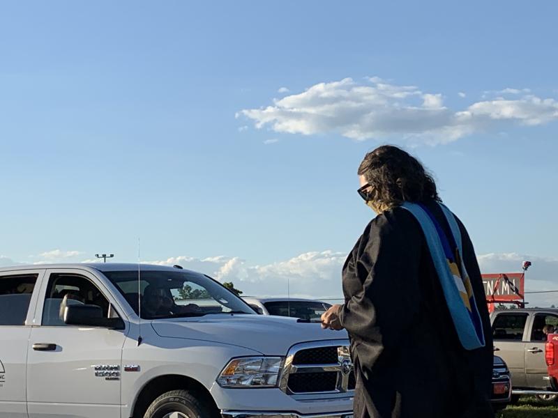 Teacher and graduation speaker Prema Long crosses the track before the ceremony. SUSAN JOHNS/Wiscasset Newspaper