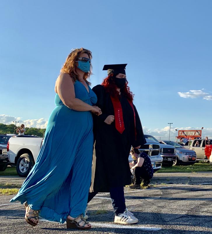 Wiscasset School Committee’s Desiree Bailey escorts daughter Gabrianna Bailey to “Pomp and Circumstance” at Wiscasset Speedway June 12. SUSAN JOHNS/Wiscasset Newspaper