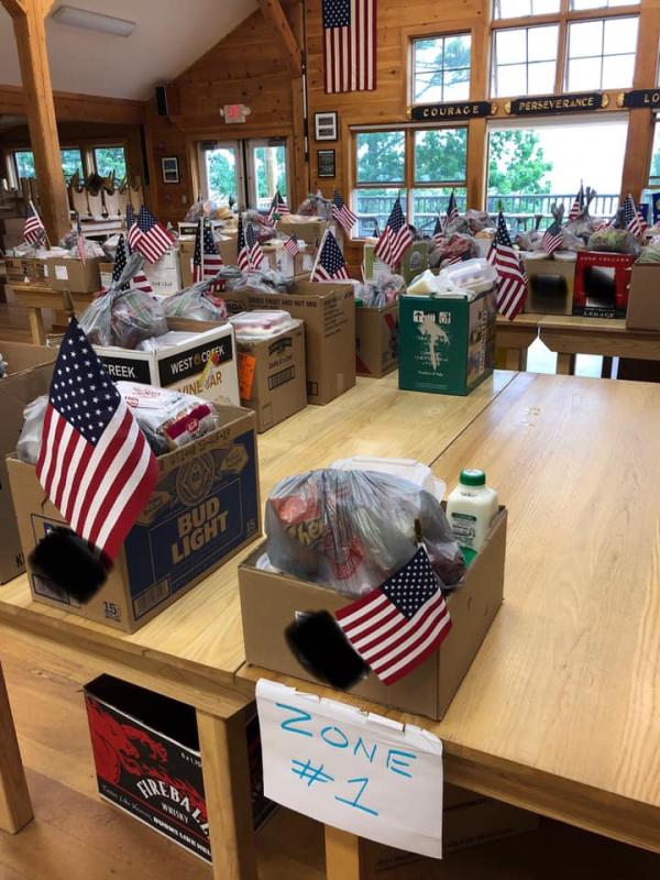Meal delivery boxes set to go out from the Kieve Wavus Inc. dining hall in Nobleboro. Kieve Wavus has been preparing and delivering meal deliveries as part of the Lincoln County Food Initiative effort to provide food relief during the COVID-19 crisis. Courtesy photo