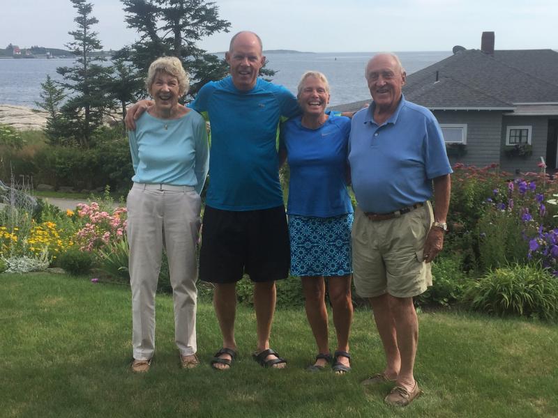 Tim and Tracy Johnson, center, with his parents, Sally and Allen Johnson at Sally and Allen’s Ocean Point home. LISA KRISTOFF/Boothbay Register