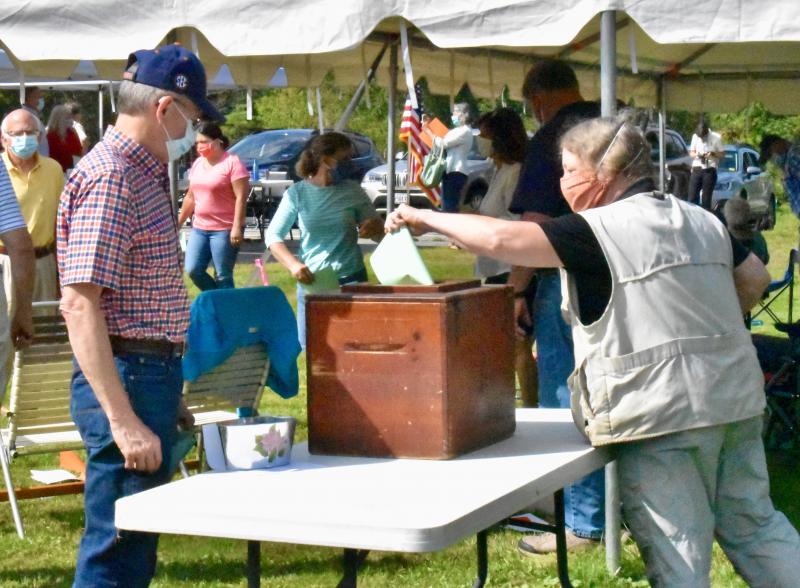 Casting ballots on the marijuana ordinances. PHIL DI VECE/Wiscasset Newspaper