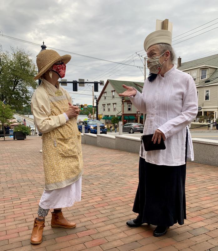 Walk Around Wiscasset organizer Lucia Droby, left, and attendee Chris Grosser chat along the downtown’s new sidewalk. SUSAN JOHNS/Wiscasset Newspaper