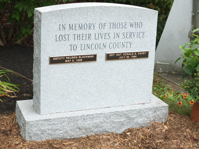 Lincoln County commissioners hosted a dedication service Aug. 4 for a monument to the memory of two deputies who died in the line of duty. BILL PEARSON/Boothbay Register