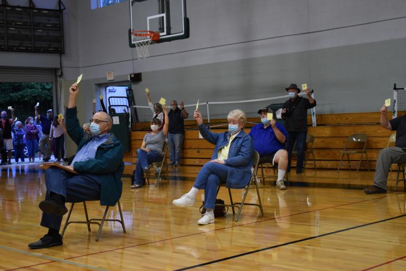 By an almost unanimous show of hands, voters approve the parks and recreation budget. PHIL DI VECE/Wiscasset Newspaper