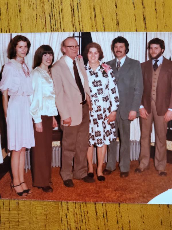 The Moore family celebrates the 35th wedding anniversary of Doug and Bennie Alice, center. Betty and Ginny are on the left and Wayne and Bob are on the right. Courtesy of Ginny Moore Murray