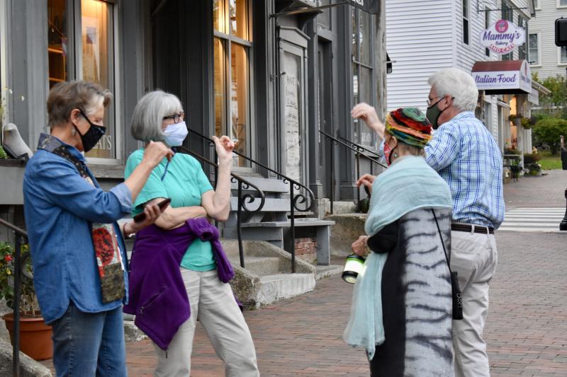 Enjoying the early autumn evening outside Treats are, from left, Christine Hopf-Lovette, Sally Gemmill, Lucia Droby and Rick Burns. PHIL DI VECE/Wiscasset Newspaper