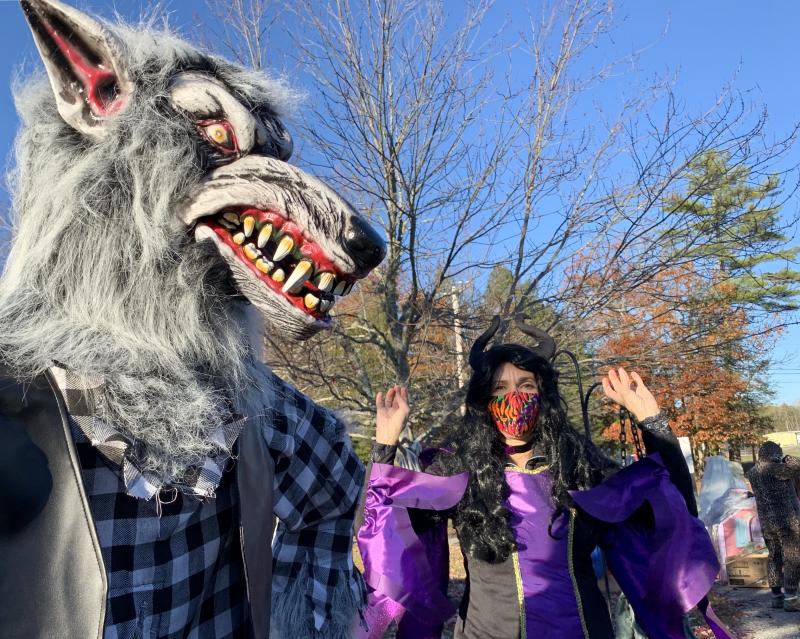 Wiscasset’s Sherri Dunbar strikes a pose near a werewolf-like decoration. SUSAN JOHNS/Wiscasset Newspaper
