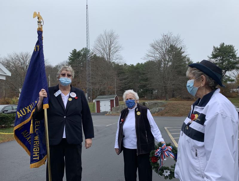 From left, auxiliary members Diane Munsey, Jane LeBourdais and Sandra Winters prepare for the ceremony. SUSAN JOHNS/Wiscasset Newspaper