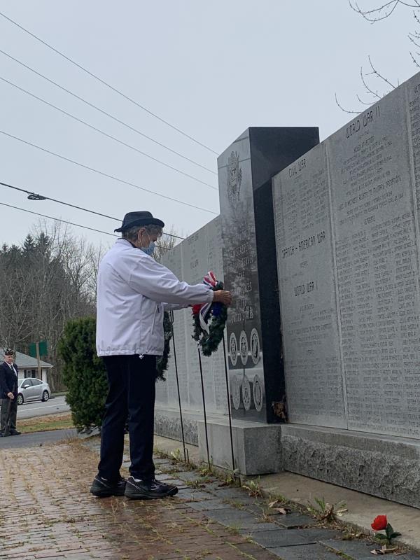 American Legion Post 54 Auxiliary President Sandra Winters lays a wreath at the veterans wall in Wiscasset in a Veterans Day observance. SUSAN JOHNS/Wiscasset Newspaper