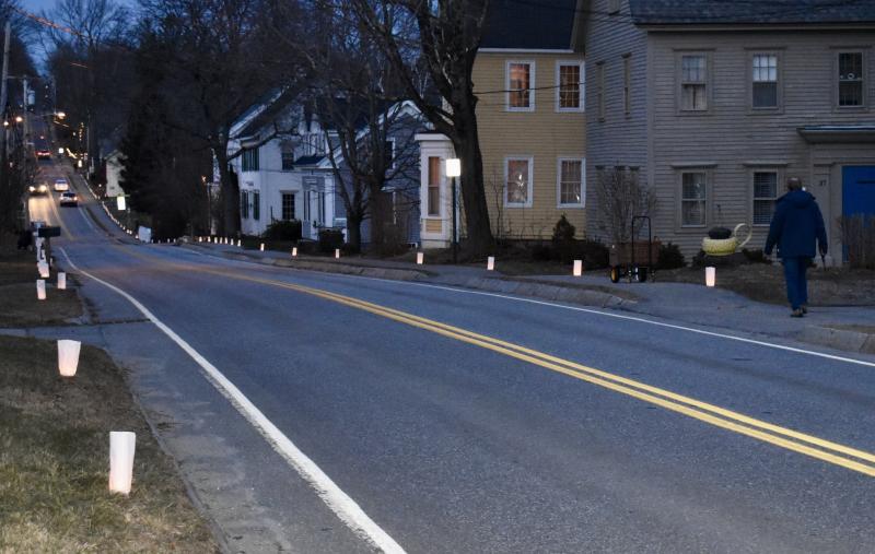 Federal Street is illuminated with candles Jan. 19 to remind us of all the lives lost during the pandemic. PHIL DI VECE/Wiscasset Newspaper