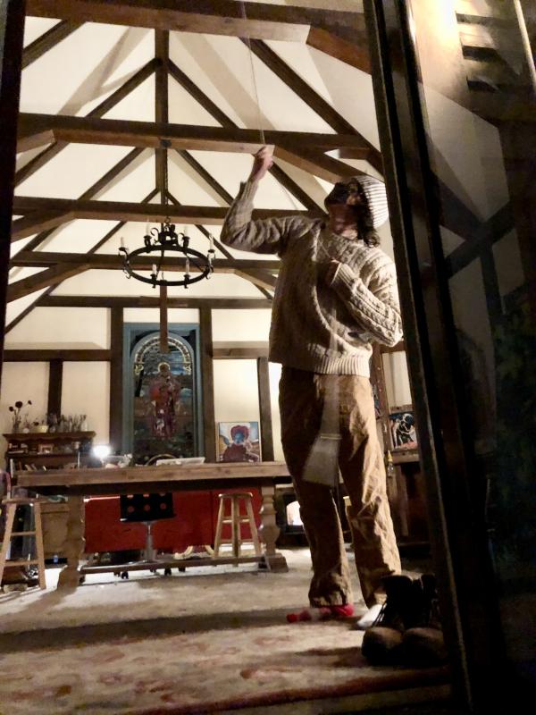Xavier Chung rings the bell of a private chapel on Federal Street. Courtesy of Terry Heller