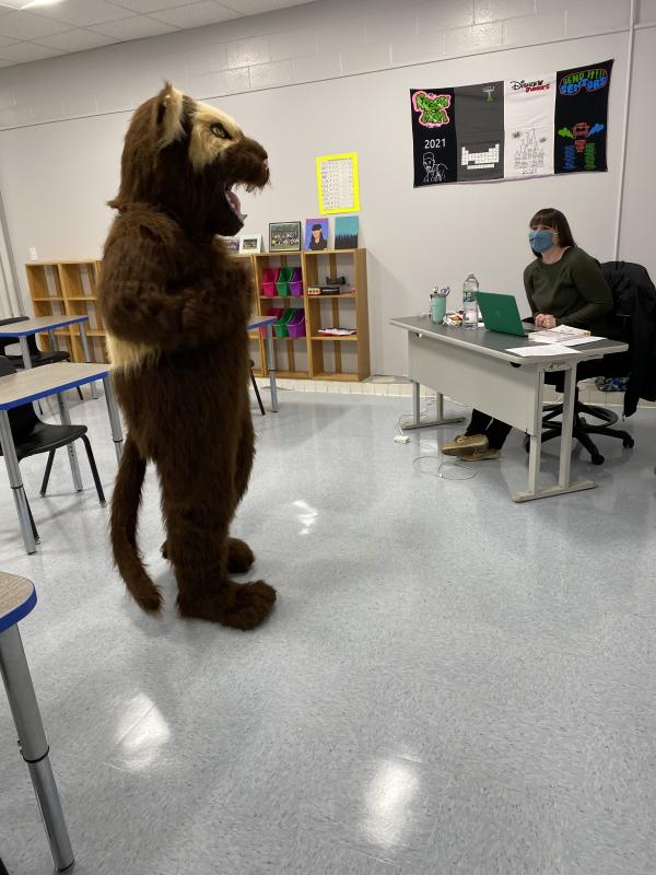 Student Ty Delong, dressed in the WMHS mascot costume, chats with health teacher Liz Hemdal in the new classroom. Deb Pooler photo