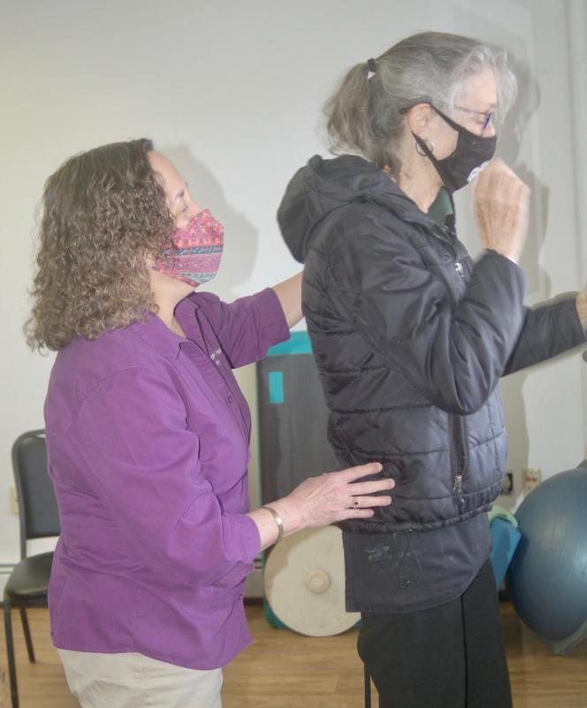Chamber member Susan Robson tries a balance exercise. ART MAYERS/Wiscasset Newspaper