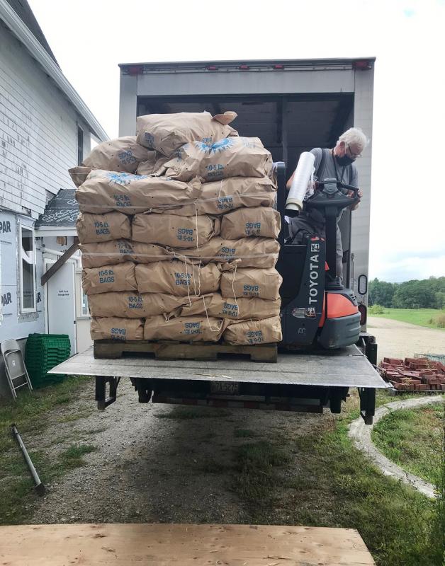 Twin Villages Foodbank Farm receives a shipment of food from Good Shepherd Food Bank at the food storage hub at Coastal Rivers’ Round Top Farm. Courtesy of Hannah McGhee