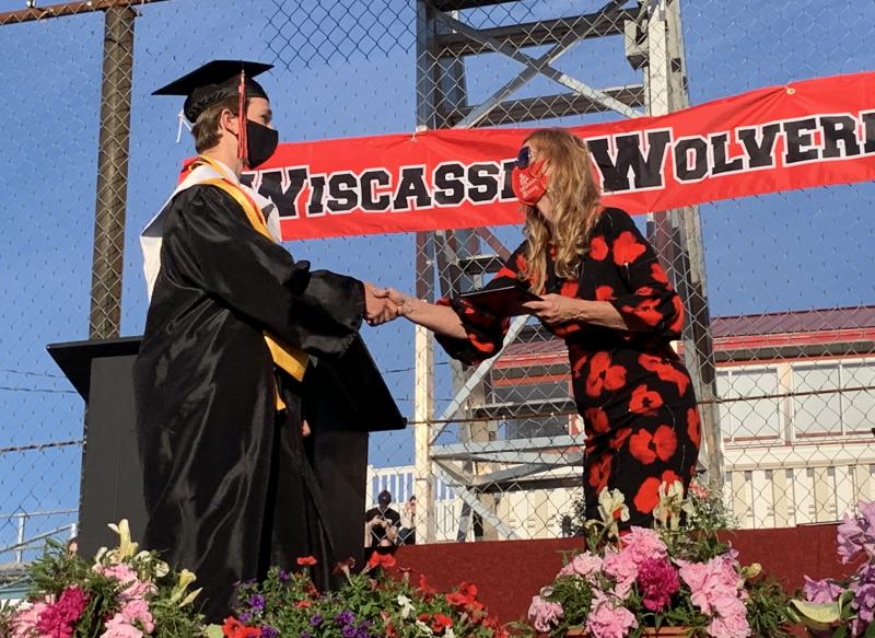 Superintendent of Schools Terry Wood hands a student his diploma. SUSAN JOHNS/Wiscasset Newspaper