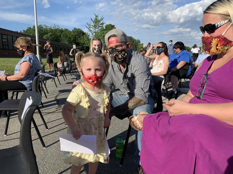 Senior Kailey Smiley’s sister Paisley Smiley, 3, their parents Shirley and David Smiley of Chelsea and, behind David and Paisley, David and Shirley’s daughter Chloe, 15, await the senior awards ceremony June 9 outside Wiscasset Middle High School. SUSAN JOHNS/Wiscasset Newspaper