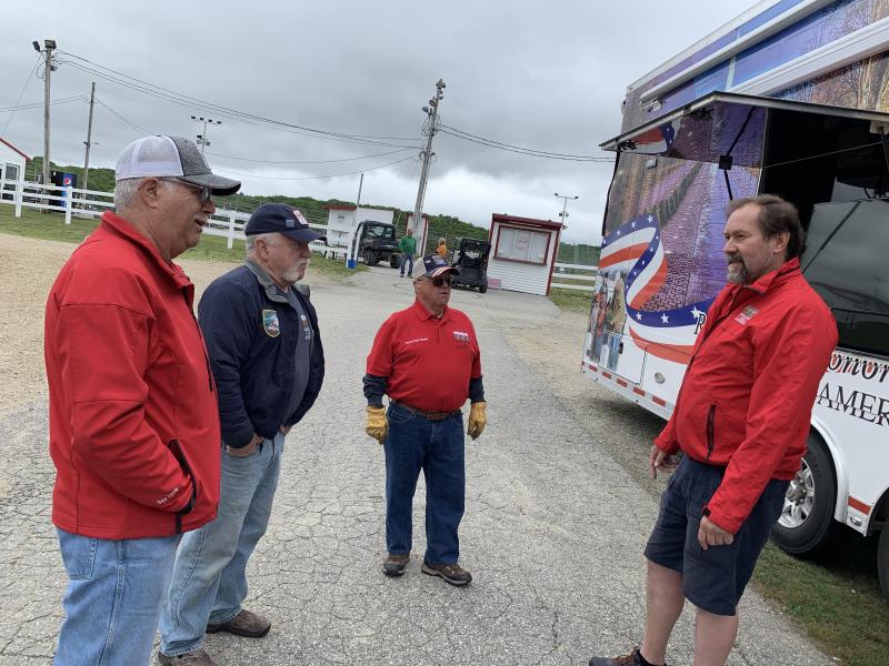 From left, volunteers William Phillips, Joe Spear Jr. and Richard Barter meet with Wreaths driver-ambassador Stefan Brann, far right. SUSAN JOHNS/Wiscasset Newspaper