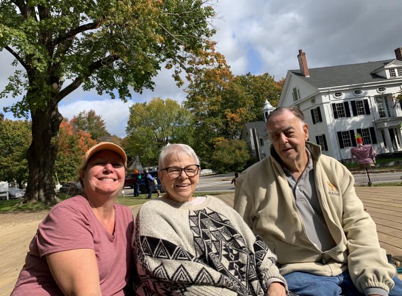 From left, Wiscasset Area Chamber of Commerce board member Monique McRae, Chamber Manager Pat Cloutier and Cloutier’s husband and WACC volunteer Russell Cloutier man the common where businesses and others were bringing their entries Oct. 9 for WACC’s scarecrow contest. SUSAN JOHNS/Wiscasset Newspaper