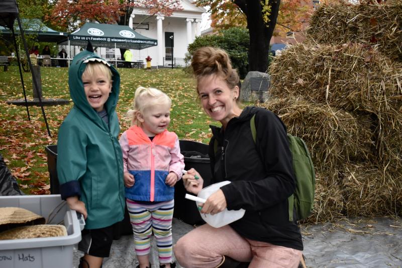 Allison Henderson and her children Jack, left, and Charlie and made the morning’s first scarecrow. PHIL DI VECE/Wiscasset Newspaper