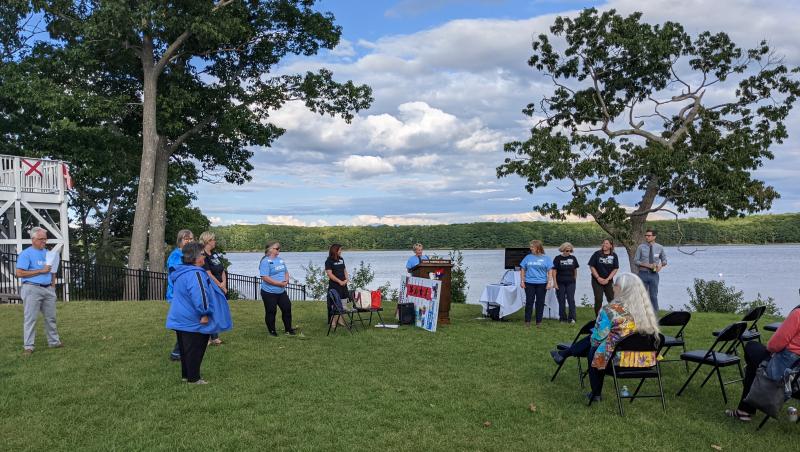 Campaign Co-Chairs Barb McCue (at podium) and Bob McCue (far left) join with other United Way volunteers at the Campaign Kick-off in September. Courtesy photo